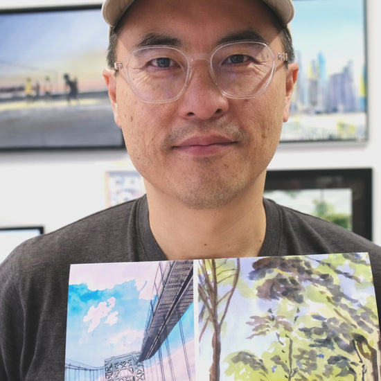 Francis Hsueh flipping through his new 2026 calendar
